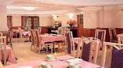 The breakfast room at Pembridge Palace Hotel