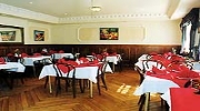 The dining room at London Guards Hotel