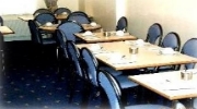The breakfast room at Warick Hotel London